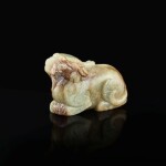 A celadon and russet jade figure of a mythical beast, Ming dynasty 明 青玉瑞獸