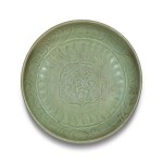 A Longquan Celadon dish, Ming Dynasty | 明 龍泉窰青釉刻花卉紋盤