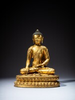 A gilt-copper alloy figure of Shakyamuni Buddha, Tibet, 15th century | 十五世紀 藏傳銅合金鎏金釋迦牟尼佛坐像