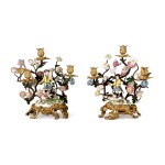 A PAIR OF MEISSEN PORCELAIN MOUNTED GILT-BRONZE AND TOLE-PEINTE THREE-LIGHT CANDELABRA, THE PORCELAIN AND MOUNTS, MID-18TH CENTURY