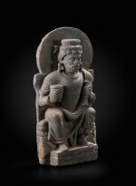 A grey schist figure of seated Indra Gandhara, 2nd-4th century | 犍陀羅 二至四世紀 灰片岩雕因陀羅坐像