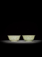 A pair of reticulated pale celadon jade 'gourd' bowls, Qing dynasty, 18th century | 清十八世紀 青白玉鏤雕葫蘆紋盌一對