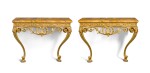 A PAIR OF GEORGE III CARVED GILTWOOD CONSOLE TABLES, CIRCA 1770