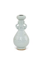 A qingbai carved 'elephant'-handled vase Yuan dynasty 元 青白釉刻花象首雙耳瓶