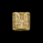 A mottled pale grey jade bead, Shang/Western Zhou dynasty | 商/西周 玉珠