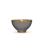 A small purple-splashed 'Jun' cup, Northern Song / Jin dynasty | 北宋 / 金 鈞窰天藍釉紫斑小盃
