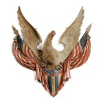 IMPORTANT CARVED AND POLYCHROME PAINT-DECORATED SPREAD-WINGED AMERICAN EAGLE WITH DRAPED FLAGS AND SHIELD, JOHN HALEY BELLAMY (1836-1914), KITTERY POINT, MAINE, CIRCA 1900