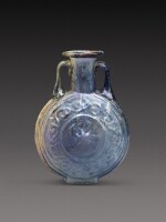 A Roman Pale Blue Mould-Blown Glass Flask, circa 1st century A.D.