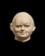 An Etruscan Terracotta Head of a Boy, circa 2nd Century B.C.