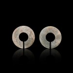 Two pale celadon jade slit rings, jue, Eastern Zhou dynasty 東周 青白玉玦兩件