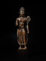 A large silver and copper-inlaid copper alloy figure of Padmapani, Ladakh or Western Tibet, 11th - 12th century