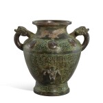 An inscribed archaistic malachite-and-silver inlaid bronze wine vessel, lei, Song dynasty 宋 銅錯銀嵌綠松石仿古獸耳罍