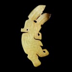 A yellow jade 'parrot' plaque Late Shang dynasty | 商晚期 黃玉鸚鵡珮     