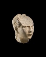 A Roman Marble Portrait Head of a Young Woman, early 1st Century A.D.