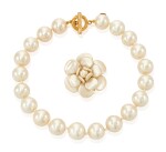 A FAUX PEARL NECKLACE AND A CAMELLIA BROOCH 