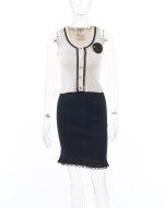 CHANEL | BLACK AND OFF-WHITE TANK TOP AND SKIRT WITH CAMELLIA BROOCH 
