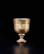 A fine and rare gilt-bronze engraved wine cup Tang dynasty  | 唐 鎏金銅鏨花高足盃