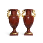 A Pair of Monumental Berlin (K.P.M.) 'Rosso Antico' Faux-Marble Vases, 'Französische form mit Greifenkopfhenkeln', Circa 1849-70