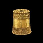 A gold royal ear plug decorated with exceptionally fine filigree work Thailand, 14th century | 泰國 十四世紀 皇室鏨花金耳飾