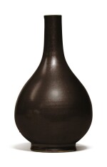 An iron-rust-glazed bottle vase, Qing dynasty, 18th / 19th century