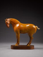 A large amber-glazed pottery model of a horse, Tang Dynasty | 唐 黃釉馬