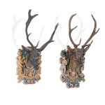 A pair of Continental carved and painted stags heads, probably German or Austrian, late 17th century