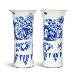 A pair of blue and white 'birds and flowers' beaker vases, Qing dynasty, Shunzhi period | 清順治 青花花鳥紋花觚一對