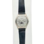 Reference 5040, A white gold tonneau shaped automatic perpetual calendar wristwatch with moon phases, 24 hour and leap year indication, factory single-sealed, Circa 2002