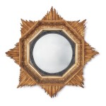 A REGENCY GILT AND EBONISED WOOD STARBURST CONVEX MIRROR, EARLY 19TH CENTURY