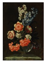 BARTOLOMEO LIGOZZI | A STILL LIFE OF WHITE ROSES, HYACINTHS, RED CARNATIONS, ANEMONES AND OTHER FLOWERS IN A GLASS VASE ON A STONE SURFACE