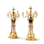 A pair of Louis XVI six-light candelabra, circa 1785, attributed to Pierre-Philippe Thomire