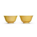 A pair of yellow-glazed incised 'dragon' bowls, Marks and period of Guangxu | 清光緒 黃釉暗刻海水龍紋盌一對 《大清光緒年製》款