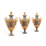 A set of three Neoclassical gilt and painted metal half vases, modern | Ensemble de trois demi-vases en métal peint et doré de style néoclassique, moderne