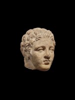 A Roman Marble Head of a Youth, circa 2nd/3rd Century A.D.
