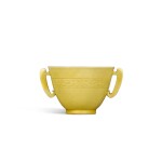 A yellow-glazed handled cup, Mark and period of Kangxi | 清康熙 黃釉暗刻龍紋耳盃 《大清康熙年製》款   