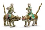 Two Extremely Rare Chinese Export Famille-verte Glazed Biscuit Figures of Luohan and Tigers, Qing Dynasty, Kangxi Period | 清康熙  素三彩伏虎羅漢兩尊