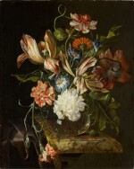 Still life of flowers, with peonies, carnations, variegated tulips and other assorted flowers arranged in a glass vase on a velvet draped stone ledge