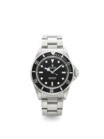 ROLEX | REF 14060 SUBMARINER, A STAINLESS STEEL AUTOMATIC WRISTWATCH WITH BRACELET CIRCA 1995