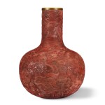 An impressive and rare large carved cinnabar lacquer 'nine dragon' vase, Tianqiuping Qing dynasty, Qianlong period | 清乾隆 剔紅海水九龍紋天球瓶