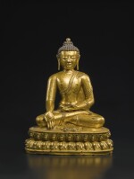 A Gilt Copper Alloy Figure of Ratnasambhava, Tibet, Style of Densatil, 14th/15th Century