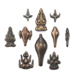 A group of 10 copper-alloy 'conch', 'flaming triple gem' and 'ram and stupa' thogchags, Tibet, 12th century or later 十二世紀或更後 西藏 各式天鐵一組十件