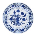 A fine Ming-style blue and white 'lotus bouquet' dish, Mark and period of Yongzheng | 清雍正 青花一把蓮紋盤 《大清雍正年製》款