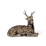 A rare figure of a recumbent deer Qing dynasty, 18th/19th century | 清十八/十九世紀 褐釉瑞鹿擺件