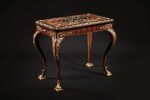 An Italian Rococo Engraved Ivory and Mother-of-Pearl Inlaid, Kingwood, Boxwood, Ebony, Amaranth and Carved and Giltwood Marquetry Rectangular Center Table, by Pietro Piffetti, probably after a design by Filippo Juvarra, Circa 1730-31