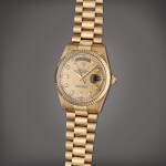 Reference 18038 Day-Date | A yellow gold automatic wristwatch with day, date, and bracelet, Circa 2001