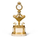 A Regency gilt-bronze and white marble watch stand, 19th century