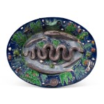 A Palissy-type moulded large dish "plat aux reptiles", circa 1600