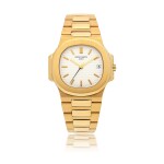 PATEK PHILIPPE | NAUTILUS, REF 3800  YELLOW GOLD WRISTWATCH WITH DATE AND BRACELET  CIRCA 1985