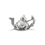 A French silver-plated teapot shaped as a dromedary for Mariage Frères, Paris, circa 1970 | Théière en métal argenté à décor de dromadaire pour Mariage Frères, Paris, vers 1970