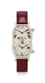 CARTIER | COLLECTION PRIVÉE - TONNEAU TWO TIME ZONES, REFERENCE 2487, A LIMITED EDITION PLATINUM DUAL TIME ZONE WRISTWATCH, MADE TO COMMEMORATE MACAU'S HANDOVER TO THE PEOPLE'S REPUBLIC OF CHINA, MADE IN 1999